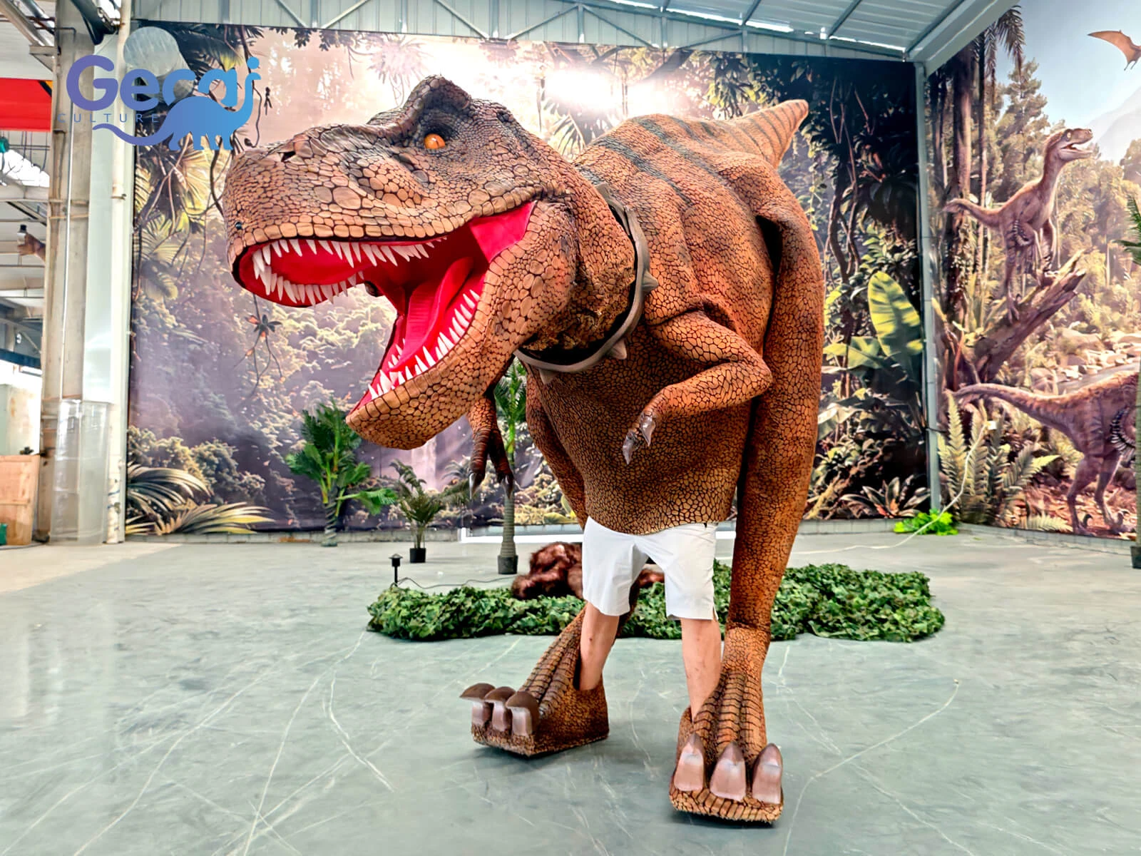 Realistic T-Rex costume with visible legs, lifelike details and flexible movement. Custom dinosaur costumes for theme parks, shows and events.