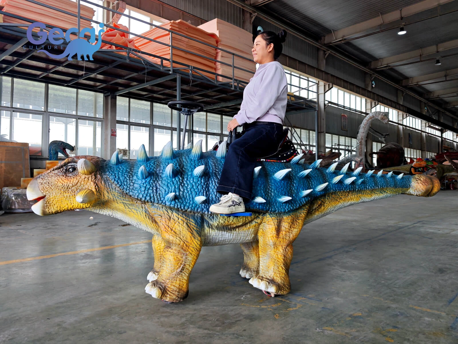 Walking Ankylosaurus ride for theme parks with realistic armor details and motorized movement. Custom dinosaur rides for family attractions.